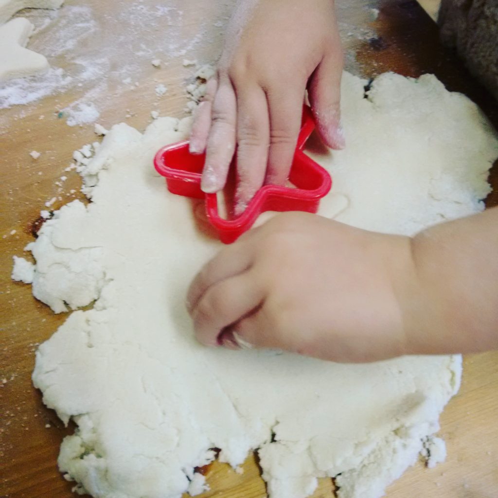 Cutting out salt dough shapes